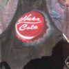 close up of apron with "Nuka Cola" design