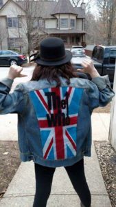 Denim jacket, painted the "The Who" logo, being worn