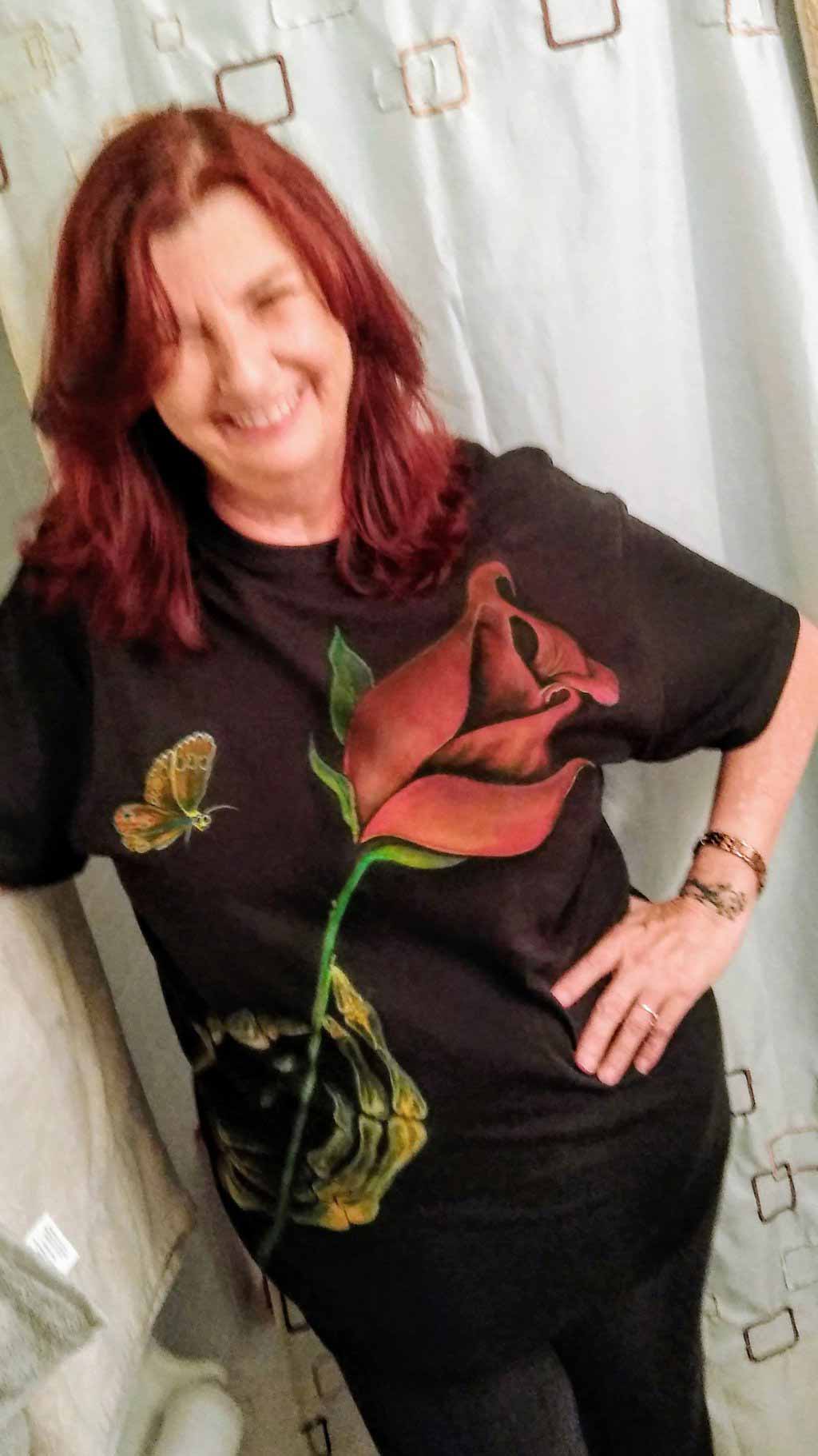 Customer wearing T-shirt, "A Skeleton's Offering"